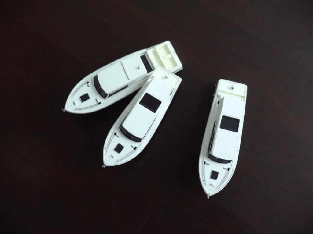 Long row of similar yachts moored in a Mediterranean marina